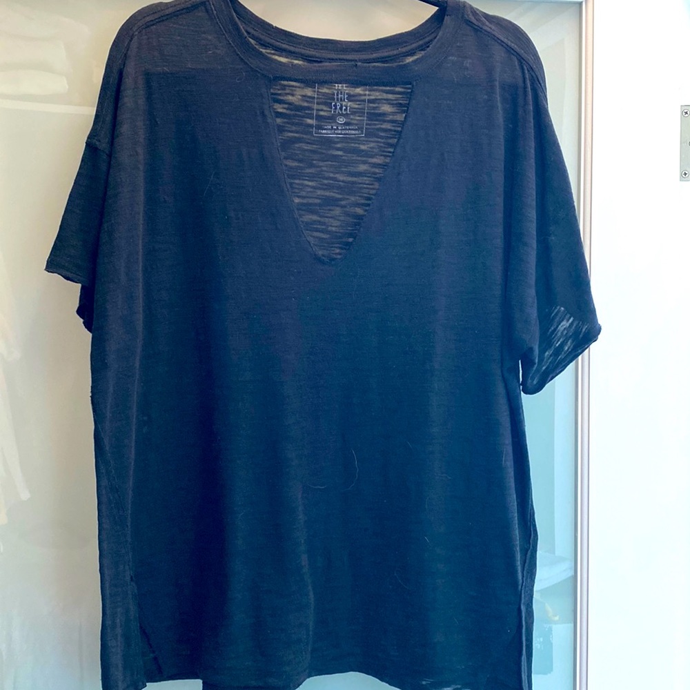 We the free oversized tee with cute low neck detail.